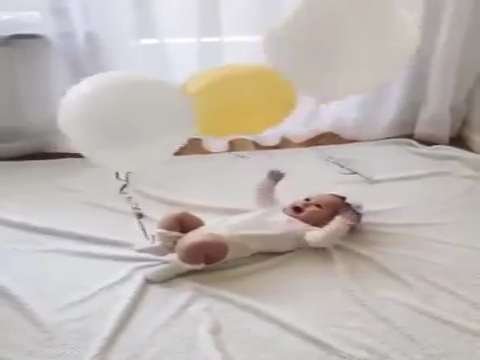 Baby laughs funny balloons tied to hands and feet | cute funney  status